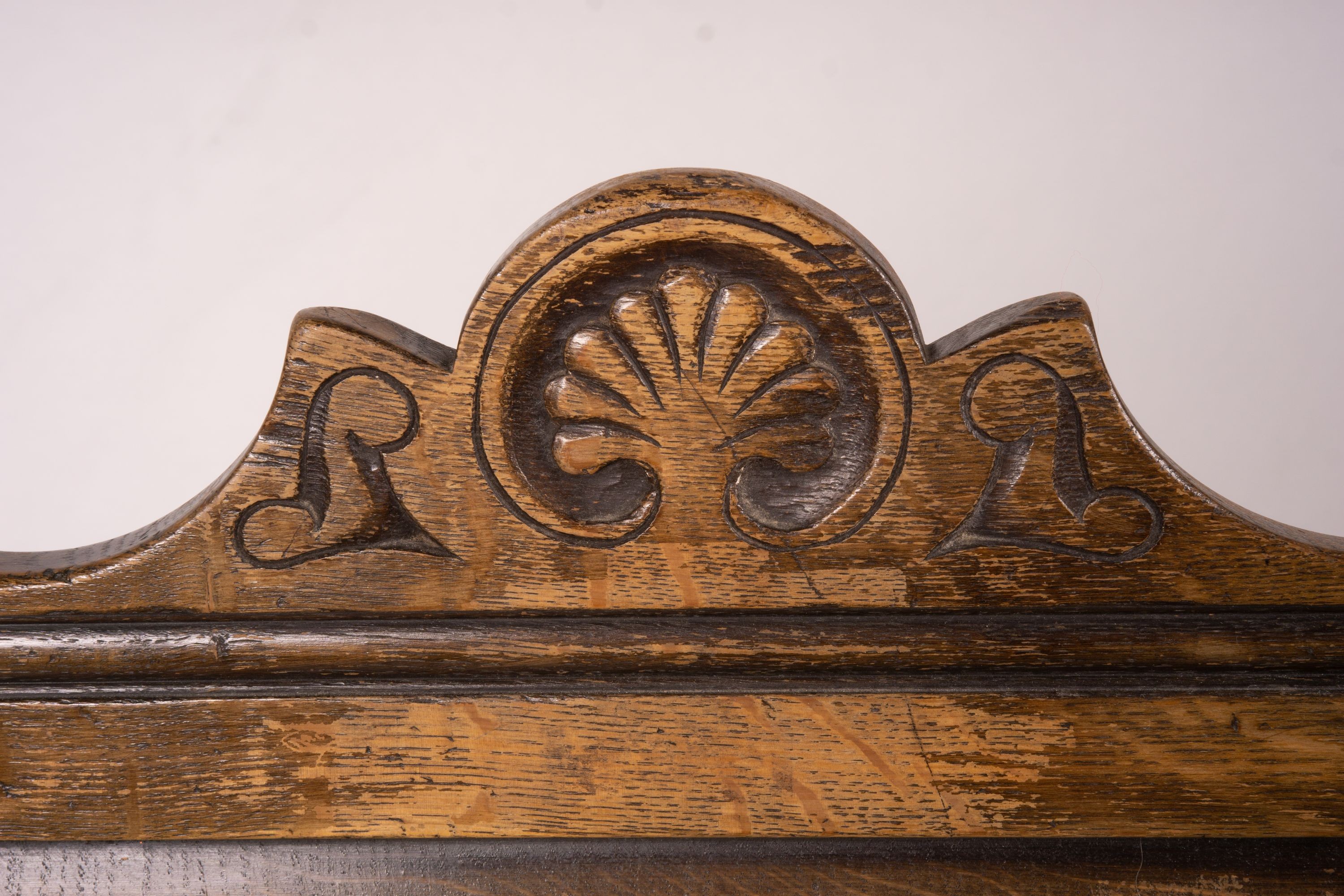 An early 20th century carved oak wainscot chair